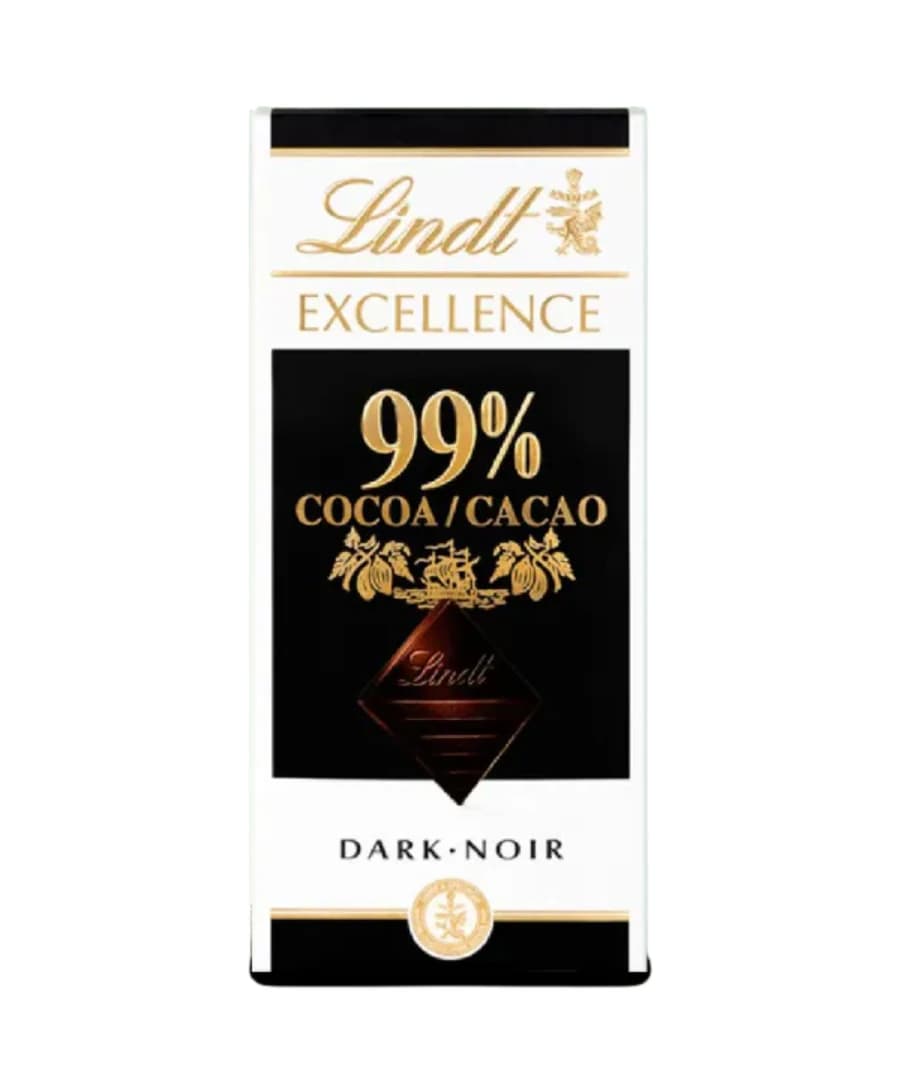Lindt Excellence 99% Cocoa Dark Chocolate bar in a sleek black and white packaging. The front features elegant gold lettering and a diamond logo, highlighting its rich cocoa content. Pack size: 50g.